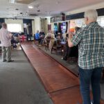 Man Bowling with skittles