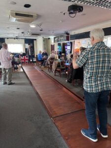 Man Bowling with skittles